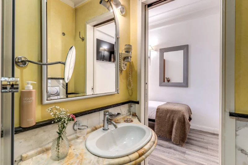 Private bathroom with marble sink, mirror and view of single room near Rome Opera House - Depandance Opera, BZAR hotels in Rome