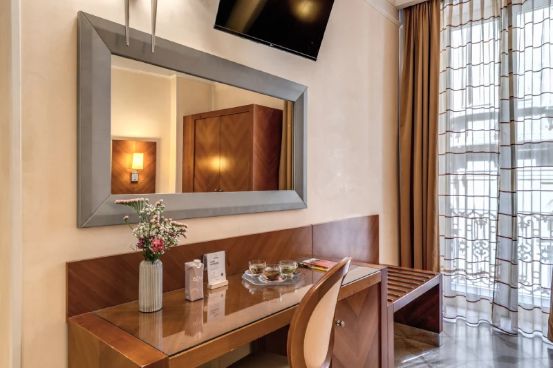 Desk with large mirror, TV and welcome amenities, bright window near Rome Opera House - Depandance Opera, BZAR hotels in Rome