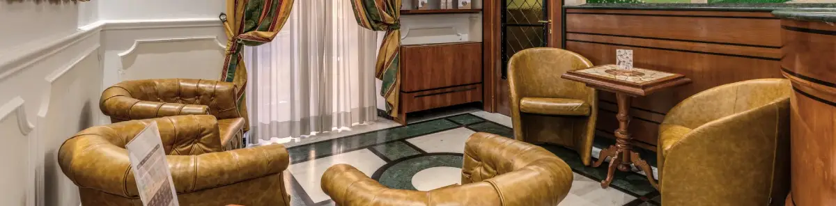 Relax lounge with leather armchairs and tables in hotel near Rome Opera House - Hotel Sonya, BZAR hotels in Rome